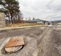 Plots - housing in Veľká Bytča, Bytča, with a view of the surroundings and trees.