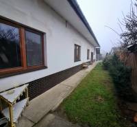Family house on 1st May Square in Chtelnica with a side walkway and a garden.