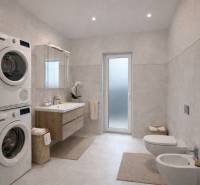 A bathroom in a family house with a shower, washing machine, and dryer with white tiles.