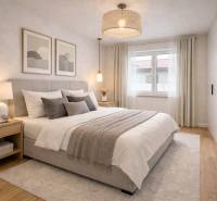 Bright bedroom with a large bed, nightstands, and a wooden decor floor in a family house.