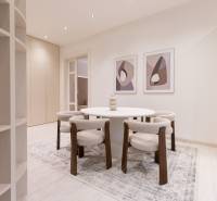 Dining area in a 3-room apartment with a round table and chairs on a wood-patterned floor.