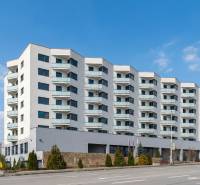 Apartment building on Rybničná Street in Bratislava - Vajnory with balconies and greenery.