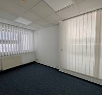 Offices with white blinds and dark carpet, Stará Vajnorská in Bratislava - Nové Mesto.