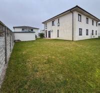 Exterior of a 3-room apartment on Kráľovianky Street in Kráľovianky with a lawn and a fence.