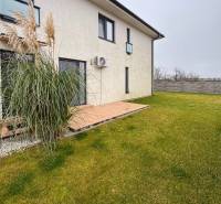 Exterior of a 3-room apartment on Kráľovianky Street in Kráľovianky with a garden and lawn.