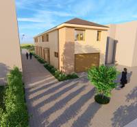 A two-story building with a road on Litoměřická Street in Topoľčianky, surrounded by trees.