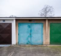 Colorful garage doors on Inovecká Street in Trenčín, various shades and textures.