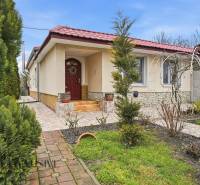 A family house in Čierny Brod surrounded by a landscaped garden with a terrace and a gazebo.