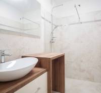Bathroom with a sink and wooden decor, Family house.