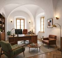 The interior of the building with comfortable furniture and a wooden decor floor.