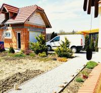 Family house in Ratkovce with an unfinished construction, delivery, and landscaped garden.