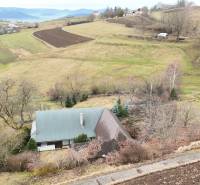 A cottage in Hriňová on Zánemecká Street surrounded by hills and vast countryside.