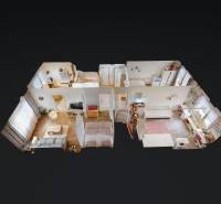 3D floor plan of a 3-room apartment with zones featuring wood decor flooring.