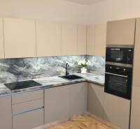 Kitchen in a 4-room apartment with a kitchen unit, appliances, and flooring with a wood decor.