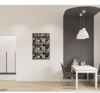 Dining area with a table and chairs in a 3-room apartment, floor with wooden decor.