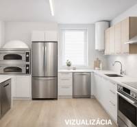 Interior of a kitchen with modern equipment and a wooden decor floor.