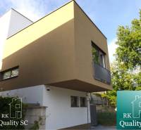 Modern facade of a 3-room apartment at Sunny Lakes South in Senec with a wooden decor.