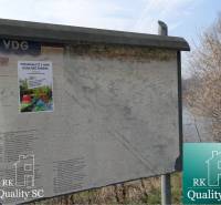 Information board with a map and poster on Starý prístav Gabčíkovo street.