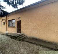 A family house in Neded with an external entrance and a simple facade.