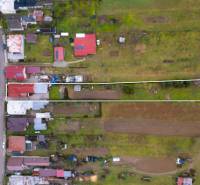 Aerial view of a family house and land in Bobot on Bobot Street.