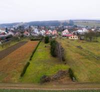 The garden in Bobot on Bobot Street, surrounded by family houses and meadows.
