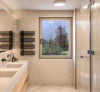 A bathroom in a 4-room apartment with natural lighting, a marble sink, and modern features.
