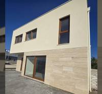 A family house in the city of Nin on Nin Street with large windows and bright walls.