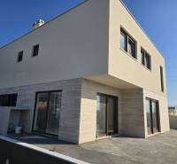 A family house in the city of Nin on Nin Street with a terrace and large windows.