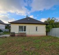 A family house on Mechenická Street in Podhorany, with a garden and a garage.