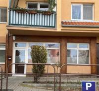 Commercial premises on Kysucká Street in Senec with a glass facade and a balcony.