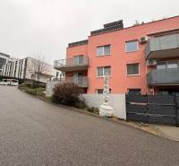 Pink building with iron balconies on Na Zlatej nohe Street, Bratislava - Nové Mesto.