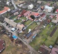 A view of the summer garden in Kláštor pod Znievom with houses and roads.