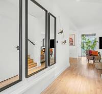 Cozy interior of a family house with a wood-decor floor and decorations.