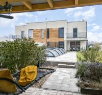 Two-story family house in Dunajský Klátov, garden, terrace, pool cover.