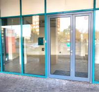 Glass entrance facade of commercial premises in Bratislava - Nové Mesto on Vajnorská Street.