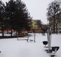 Snow-covered outdoor fitness equipment on November 17th in Prešov in front of a 1-bedroom apartment.