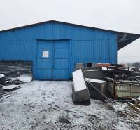 Blue metal building and clutter on Lieskovská cesta in warehouses and halls in Zvolen.