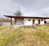 A simple family house in Dojč on Vieska Street with a garden and a shelter.