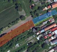 Aerial view of plots and family houses on Vieska Street in Dojč.