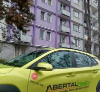 Cars of the company ABERTALrealit on Šalviová Street in front of a 2-room apartment in Bratislava - Ružinov.