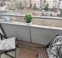 Balcony of a 2-room apartment with a view of the parking lot and greenery, Šalviová, Bratislava - Ružinov.