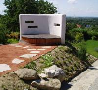 A stone path leads to the gazebo in the garden of a family house in Hainburg an der Donau.