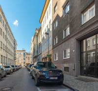 Heydukova Street in Bratislava - Old Town, with parked cars and surrounding buildings.