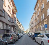 Heydukova Street in Bratislava - Old Town with parked cars and surrounding buildings.