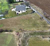 Aerial view of a house on a plot in Kuzmice on Tichá Street.