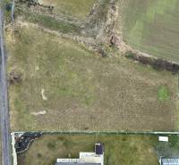 A plot suitable for living on a quiet street in Kuzmice, surrounded by nature.