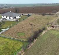 Residential plots in Kuzmice on Tichá Street with a view of the surrounding countryside.