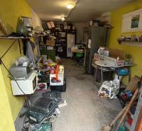 Mess in the workshop, aligned shelves, various tools and appliances in garages.