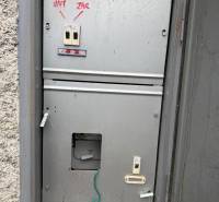 An old electrical cabinet with circuit breakers on Prachatická Street in Zvolen near the garages.