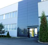 Warehouses and halls on Trenčianska Street in Nová Dubnica with a modern facade.